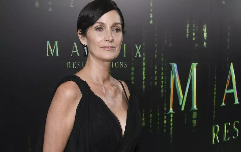 SAN FRANCISCO, CALIFORNIA - DECEMBER 18: Actress Carrie-Anne Moss attends "The Matrix Resurrections" Red Carpet U.S. Premiere Screening at The Castro Theatre on December 18, 2021 in San Francisco, California.   Steve Jennings/Getty Images/AFP (Photo by Steve Jennings / GETTY IMAGES NORTH AMERICA / Getty Images via AFP)