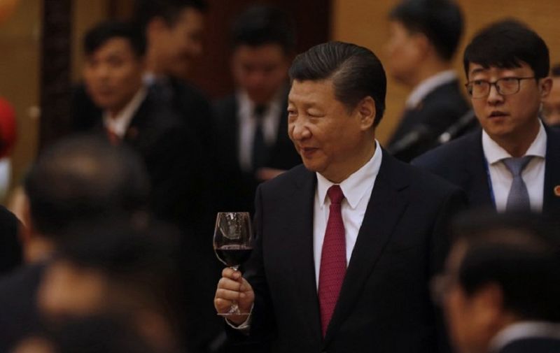 China's President Xi Jinping attends a state banquet to welcome him in Hanoi on November 12, 2017.  / AFP PHOTO / POOL / KHAM