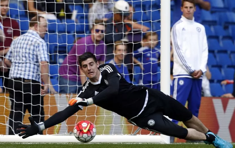Chelsea's Belgian goalkeeper Thibaut Courtois warms up during the English Premier League football match between Chelsea and Swansea City at Stamford Bridge in London on August 8, 2015. AFP PHOTO / IAN KINGTON

RESTRICTED TO EDITORIAL USE. No use with unauthorized audio, video, data, fixture lists, club/league logos or 'live' services. Online in-match use limited to 75 images, no video emulation. No use in betting, games or single club/league/player publications.