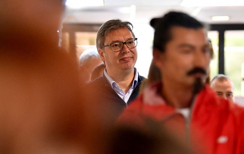 Serbian President Aleksandar Vucic waits in line to cast his ballot at a polling station in Belgrade on June 21, 2020 during an election for a new parliament in Europe's first national election since the coronavirus pandemic, though few expect major surprises with the ruling party poised to dominate a scattered opposition, some of whom are boycotting the ballot. (Photo by ANDREJ ISAKOVIC / AFP)