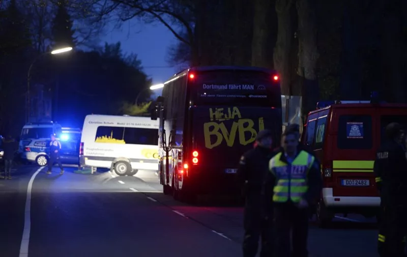 The bus of Borussia Dortmund was damaged by explosion some 10km away from the stadium prior to the UEFA Champions League 1st leg quarter-final football match BVB Borussia Dortmund v Monaco in Dortmund, western Germany on April 11, 2017. / AFP PHOTO / Sascha Schuermann