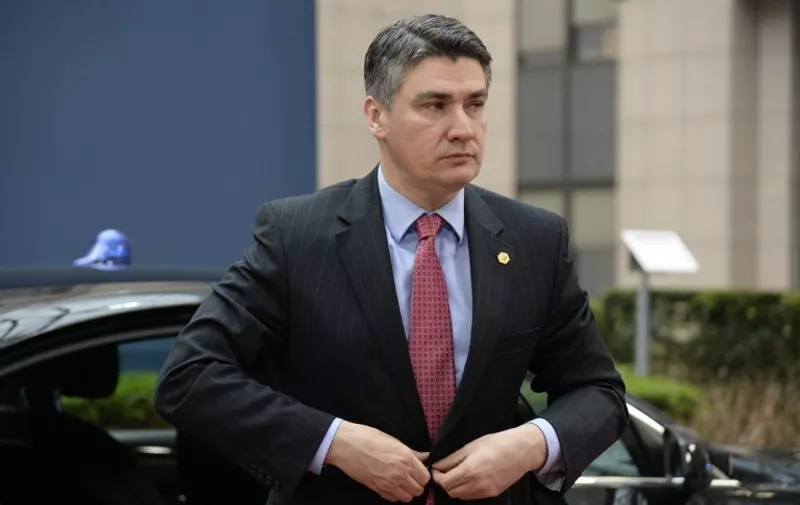 Croatian Prime Minister Zoran Milanovic arrives for a European summit in Brussels on March 20, 2015. . AFP PHOTO / THIERRY CHARLIER