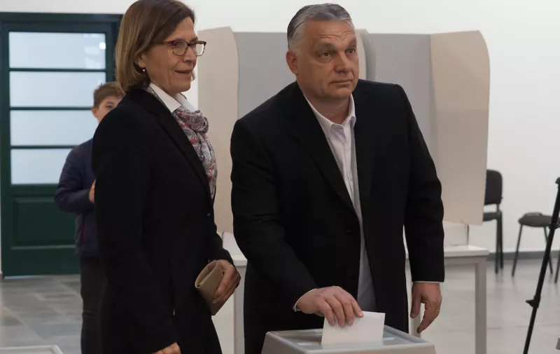 BUDAPEST, April 3, 2022  -- Hungarian Prime Minister Viktor Orban (R) and his wife Aniko Levai cast their ballots at a polling station in Budapest, Hungary, April 3, 2022.
  Voters head to the polls in Hungary on Sunday to elect a 199-seat parliament, which could give current Prime Minister Viktor Orban a fourth straight term.
   Some 7.8 million voters will cast their votes at more than 10,000 polling stations from 6 am (0400 GMT) local time until 7 pm (1700 GMT). Preliminary results are expected to come out in the evening.,Image: 677732130, License: Rights-managed, Restrictions: , Model Release: no, Credit line: Profimedia