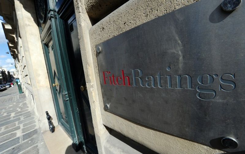 A picture shows the entrance of Fitch ratings agency on August 8, 2011 in Paris. Frankfurt and Paris stocks fell by more than 4 percent in afternoon trading on August 8, 2011, following the opening on Wall Street after last week's historic downgrade of the United States' credit rating, which compounded concerns over the world's biggest economy as well as the global outlook. AFP PHOTO MIGUEL MEDINA / AFP / MIGUEL MEDINA