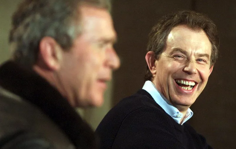 US President George W. Bush (L) and British Prime Minister Tony Blair hold a press conference 23 February 2001 in Catoctin Mountain Park in Thurmont, Maryland, just down the road from the presidential retreat Camp David.  Blair and his wife are scheduled to remain overnight at Camp David with the Bushes.                 AFP PHOTO                 MARIO TAMA     / AFP PHOTO / MARIO TAMA