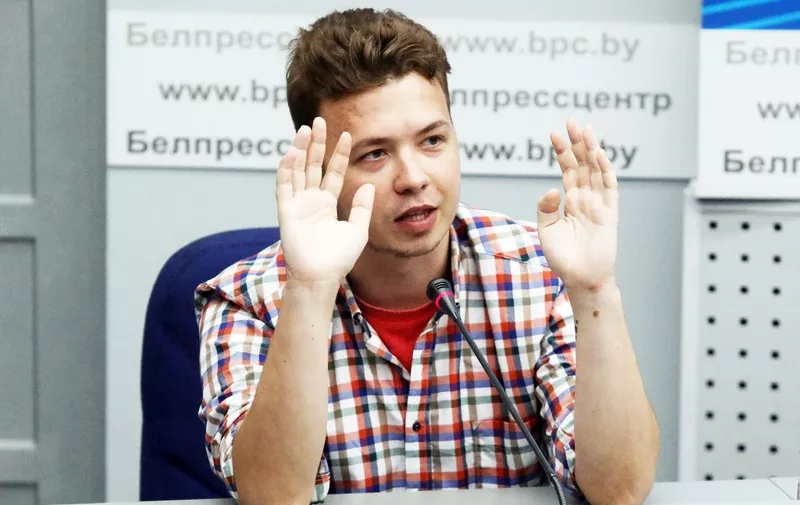 (FILES) In this file photo taken on June 14, 2021 Belarus activist Roman Protasevich, 26, takes part in a briefing for journalists and diplomats organized by the Ministry of Foreign Affairs of Belarus in Minsk. A Belarusian activist believed to have been coerced to cooperate with Minsk's KGB security service was pardoned on May 22, 2023, weeks after he was sentenced to eight years in prison. Roman Protasevich ran the Nexta Telegram account that coordinated mass protests against President Alexander Lukashenko in 2020. He was arrested in 2021 after his flight to Lithuania was forced to land in Minsk. (Photo by STRINGER / AFP)
