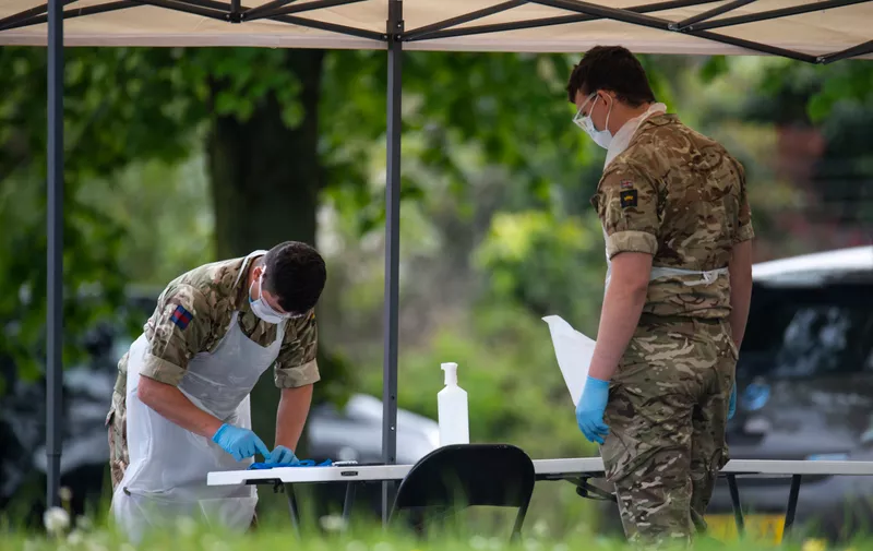 LONDON, UNITED KINGDOM - APRIL 29: Military work at a mobile drive in coronavirus testing unit for key workers at Barking Hospital on April 29, 2020 in London, England. British Prime Minister Boris Johnson, who returned to Downing Street this week after recovering from Covid-19, said the country needed to continue its lockdown measures to avoid a second spike in infections. (Photo by Justin Setterfield/Getty Images)