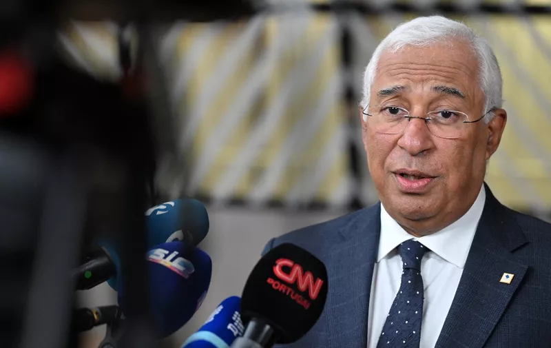 Portugal's Prime Minister Antonio Costa addresses the press as he arrives for a EU leaders Summit at The European Council Building in Brussels on October 26, 2023. EU leaders will debate starting October 26, 2023, in a two day summit in Brussels, for a call for humanitarian "pauses" in Israel's war with Hamas, as the bloc grapples with another conflict on its fringes alongside Russia's invasion of Ukraine. (Photo by JOHN THYS / AFP)
