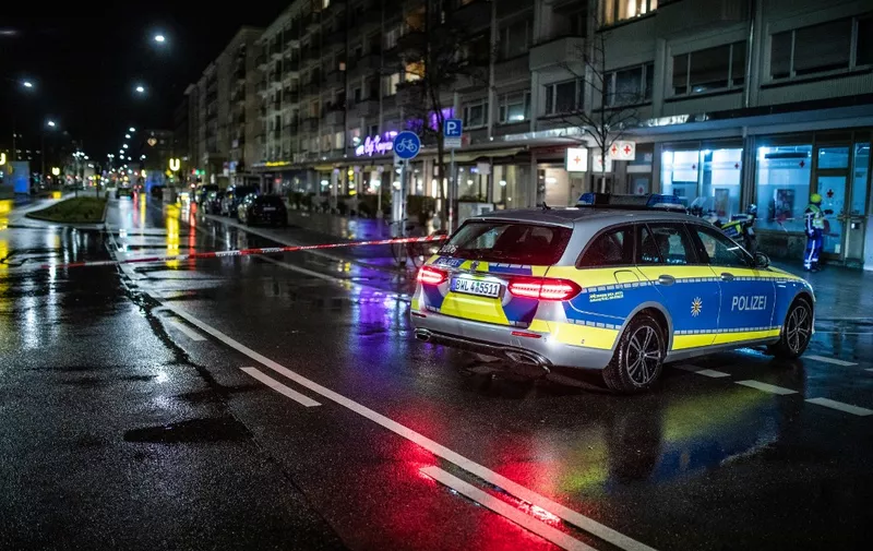 10 March 2023, Baden-Württemberg, Karlsruhe: A police patrol car is parked at a police cordon. An alleged hostage situation had occurred in a pharmacy. Photo: Christoph Schmidt/dpa (Photo by Christoph Schmidt / DPA / dpa Picture-Alliance via AFP)
