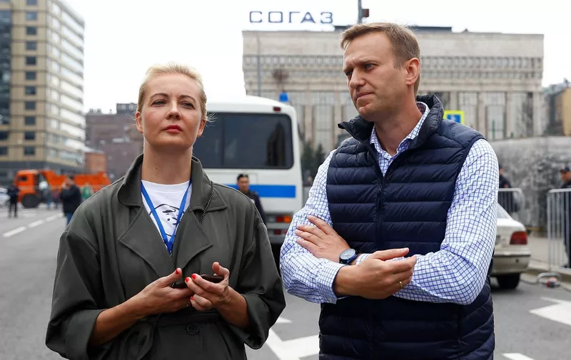 MOSCOW, RUSSIA - APRIL 30: Russian opposition leader Alexei Navalny (R) with wife Yulia (L) attend  a rally for 'free Internet' and in support of the Telegram Messenger in Akademika Sakharova Avenue in Moscow, Russia, on April 30, 2018. Sefa Karacan / Anadolu Agency (Photo by SEFA KARACAN / ANADOLU AGENCY / Anadolu via AFP)