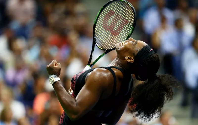 NEW YORK, NY - SEPTEMBER 08: Serena Williams of the United States celebrates after defeating Venus Williams of the United States in their Women's Singles Quarterfinals match on Day Nine of the 2015 US Open at the USTA Billie Jean King National Tennis Center on September 8, 2015 in the Flushing neighborhood of the Queens borough of New York City.   Alessandra del Bene/Getty Images/AFP