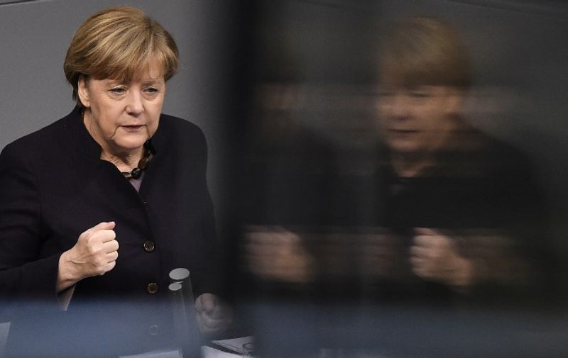 German Chancellor Angela Merkel delivers a speech during a session of the German Bundestag (lower house of parliament) in Berlin November 25, 2015. The debate focused on the 2016 federal budget.    AFP PHOTO / TOBIAS SCHWARZ / AFP / TOBIAS SCHWARZ