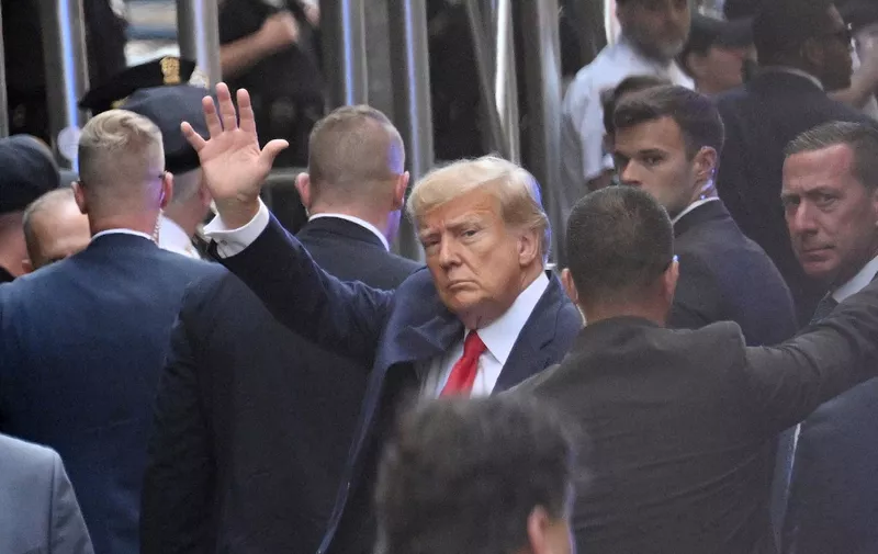 Former US president Donald Trump arrives ahead of his arraignment at the Manhattan Federal Court in New York City on April 4, 2023. - Former US president Donald Trump arrived for a historic court appearance in New York on Tuesday, facing criminal charges that threaten to upend the 2024 White House race. (Photo by ANDREW CABALLERO-REYNOLDS / AFP)