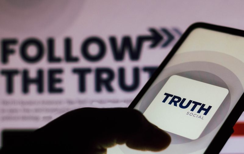 In this photo illustration, the Truth Social logo seen displayed on a smartphone. 
The social media app will be developed by Trump Media and Technology Group (TMTG).,Image: 639162018, License: Rights-managed, Restrictions: *** World Rights ***, ***
HANDOUT image or SOCIAL MEDIA IMAGE or FILMSTILL for EDITORIAL USE ONLY! * Please note: Fees charged by Profimedia are for the Profimedia's services only, and do not, nor are they intended to, convey to the user any ownership of Copyright or License in the material. Profimedia does not claim any ownership including but not limited to Copyright or License in the attached material. By publishing this material you (the user) expressly agree to indemnify and to hold Profimedia and its directors, shareholders and employees harmless from any loss, claims, damages, demands, expenses (including legal fees), or any causes of action or allegation against Profimedia arising out of or connected in any way with publication of the material. Profimedia does not claim any copyright or license in the attached materials. Any downloading fees charged by Profimedia are for Profimedia's services only. * Handling Fee Only 
***, Model Release: no