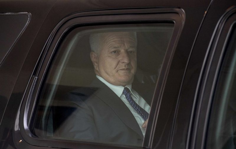 Montenegrin Prime Minister Dusko Markovic drives off in his car after talks with US Vice President Mike Pence at the White House in Washington, DC, on June 5, 2017.
Montenegro became NATO's 29th member on June 5, 2017. / AFP PHOTO / NICHOLAS KAMM