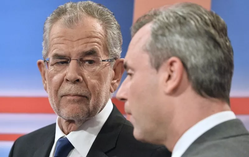 (FILES) This file photo taken on May 22, 2016 shows presidential candidates Alexander Van der Bellen (L) of Austrian Greens and Norbert Hofer (R) of Austrian Freedom party (FPOe) during a television discussion after the second round of the Austrian President elections at the Hofburg palace in Vienna.
Austria's highest court on July 1 annulled May's presidential election result following a legal challenge from the far-right Freedom Party (FPOe), whose candidate lost by a narrow margin, citing irregularities. / AFP PHOTO / APA / HARALD SCHNEIDER