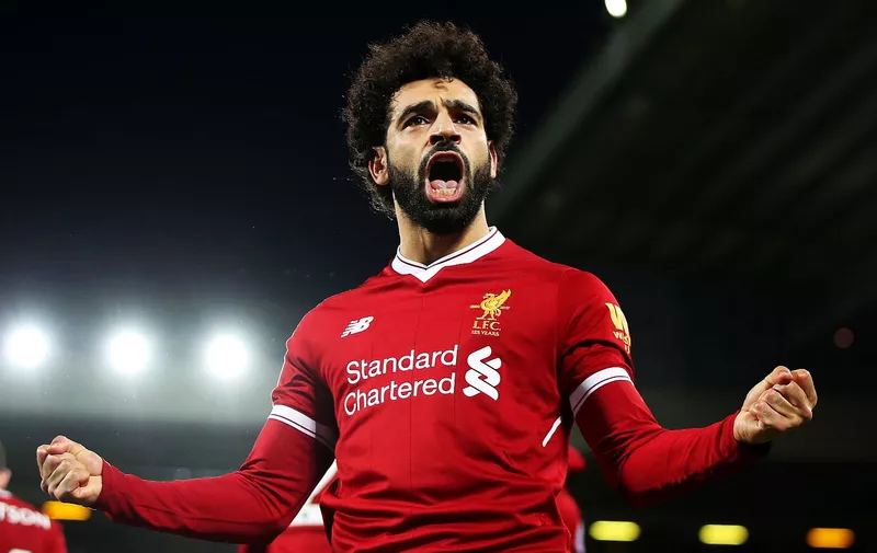 Mohamed Salah of Liverpool celebrates scoring the winning goal during the English Premier League match at Anfield Stadium, Liverpool. Picture date: December 30th, 2017., Image: 358933231, License: Rights-managed, Restrictions: RESTRICTIONS: Use subject to restrictions. Editorial use only. Book and magazine sales permitted providing not solely devoted to any one team / player / match. No commercial use. Call +44 (0)1158 447447 for further information., Model Release: no, Credit line: Profimedia, Press Association