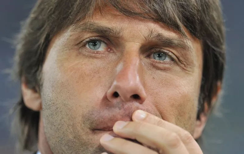 Juventus' coach Antonio Conte reacts after the Cup of Italy Juventus vs Napoli at the Olympic Stadium in Rome on May 20, 2012. Napoli defeated Juventus by 2-0. AFP PHOTO / GABRIEL BOUYS / AFP / GABRIEL BOUYS