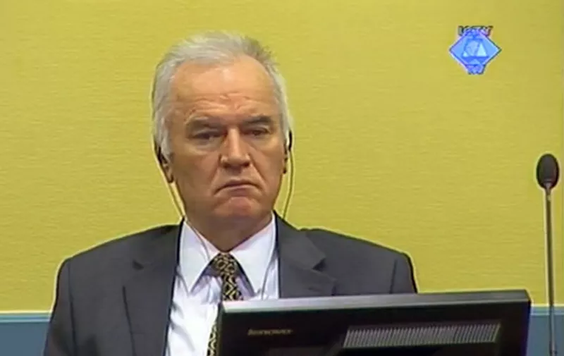 A screen grab released by the International Criminal Tribunal for the former Yugoslavia (ICTY) shows former Bosnian Serb army chief Ratko Mladic sitting in the courtroom on May 16, 2012 in The Hague. The trial of wartime Bosnian Serb army chief Ratko Mladic opened before a UN court Wednesday, where he faces charges for some of the worst atrocities committed in Europe since World War II. Mladic, 70, faces 11 overall counts for genocide, war crimes and crimes against humanity which include masterminding the massacre of almost 8,000 men and boys at Srebrenica in 1995. AFP PHOTO / COURTESY OF THE ICTY
RESTRICTED TO EDITORIAL USE - MANDATORY CREDIT "AFP PHOTO / COURTESY OF THE ICTY" - NO MARKETING NO ADVERTISING CAMPAIGNS - DISTRIBUTED AS A SERVICE TO CLIENTS
