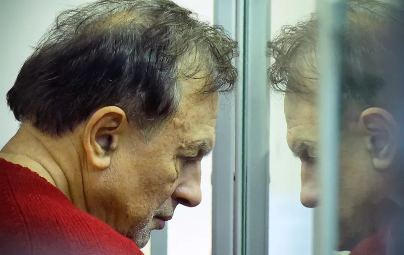 Russian professor Oleg Sokolov stands behind glass as he attends a court hearing in Saint Petersburg on November 11, 2019, after the historian confessed to the murder and the dismembering of his former student lover. Oleg Sokolov, a 63-year-old history lecturer was arrested on November 9, 2019, on suspicion of murder after he was hauled out of the icy Moika River with a backpack containing a woman's arms. Sokolov was reportedly drunk and fell into the Moika, a tributary of the Neva, in central Saint Petersburg as he tried to dispose of body parts near the offices of investigators., Image: 482254898, License: Rights-managed, Restrictions: , Model Release: no, Credit line: Olga MALTSEVA / AFP / Profimedia