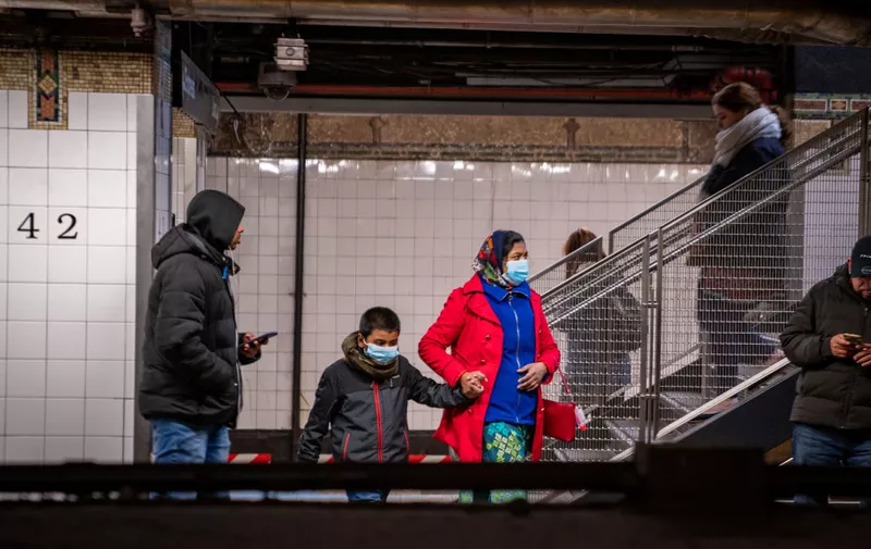 NEW YORK, NY - MARCH 5:  Travelers wear medical masks at Grand Central station on March 5, 2020 in New York City. Six people have been infected with the COVID-19 virus in New York state, all linked to a 50-year-old lawyer who lives in Westchester County and works in Manhattan. (Photo by David Dee Delgado/Getty Images)