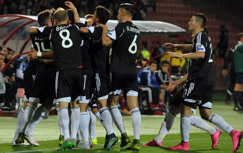 Albania's players celebrate after scoring a goal during the Euro 2016 group I qualifying football match between Armenia and Albania on October 11, 2015 at the Replubican stadium in Yerevan. AFP PHOTO / KAREN MINASYAN