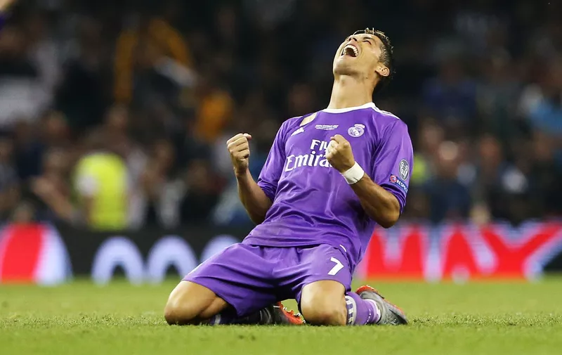 Cristiano Ronaldo of Real Madrid celebrates winning the cup during the Champions League Final match at the Millennium Stadium, Cardiff. Picture date: June 3rd, 2017.Picture credit should read: David Klein/Sportimage via PA Images, Image: 334777808, License: Rights-managed, Restrictions: RESTRICTIONS: Use subject to restrictions. Editorial use only. Book and magazine sales permitted providing not solely devoted [&hellip;]