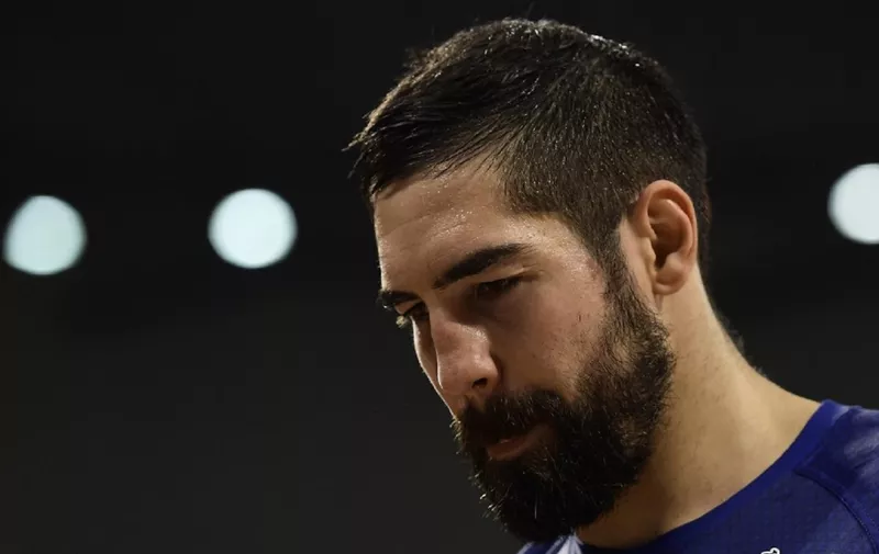 (FILES) In this file photo taken on August 21, 2016, France's centre back Nikola Karabatic leaves the court after the first halt-time of the men's Gold Medal handball match Denmark vs France for the Rio 2016 Olympics Games at the Future Arena in Rio. - PSG's athlete Nikola Karabatic suffered a cruciate ligament injury (ACL) during a handball match on October 17, 2020, which could rule the France international out for several months, his club announced on October 19. (Photo by JAVIER SORIANO / AFP)