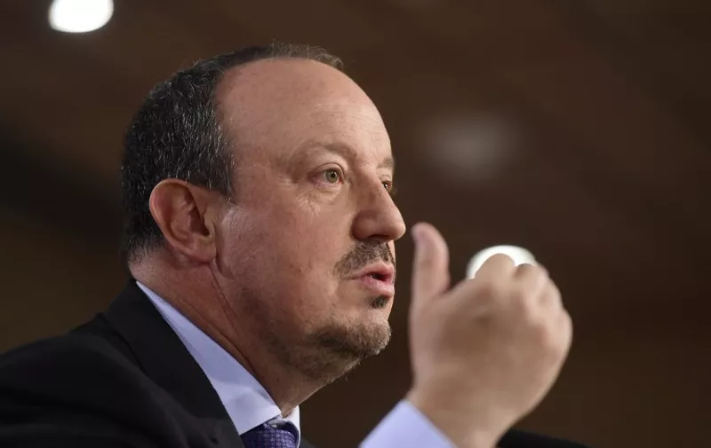 The new head-coach of Real Madrid football team, Rafael Benitez gestures during a press conference at the Santiago Bernabeu stadium in Madrid on June 3, 2015. The hiring of Rafael Benitez as Real Madrid boss today makes the Spaniard the 10th coach to serve under Florentino Perez during his two spells as the club's president between June 2000-February 2006 and since June 2009. AFP PHOTO / PIERRE-PHILIPPE MARCOU