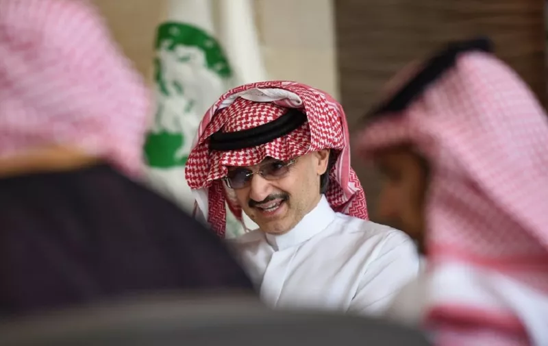 Saudi Arabia's billionaire Prince Alwaleed bin Talal gives a press conference in the Saudi capital, Riyadh, on July 1, 2015. Alwaleed pledged his entire $32-billion (28.8-billion-euro) fortune to charitable projects over the coming years. The prince said in a statement that the "philanthropic pledge will help build bridges to foster cultural understanding, develop communities, empower women, enable youth, provide vital disaster relief and create a more tolerant and accepting world." AFP PHOTO / FAYEZ NURELDINE / AFP PHOTO / FAYEZ NURELDINE