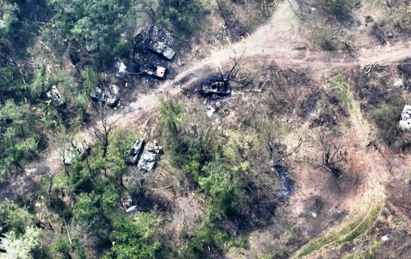 Image released by Ukraine Armed Forces on Thursday May 12, 2022 shows Russian tanks destroyed along a dirt track by the Siverskyi Donets River after their pontoon bridges blown up in eastern Ukraine, saying that the army's 80th Separate Assault Brigade had destroyed all attempts by the Russian occupiers to cross the river. Images shared by the defense ministry appeared to show a ruined pontoon crossing with dozens of destroyed or damaged armored vehicles on both banks. The Siverskyi Donets, which flows from southern Russia through the separatist Ukrainian regions of Kharkiv and Luhansk, has become a key barrier against Russia's attempts to shore up the territory it has seized since invading in February.
Ukraine Russia Battle, Siverskyi Donets River, Eastern Ukraine - 12 May 2022,Image: 690730117, License: Rights-managed, Restrictions: , Model Release: no, Credit line: Profimedia