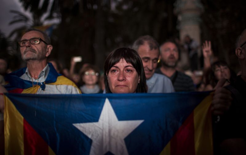 October 10, 2017 - Barcelona, Catalonia, Spain - Pro-independence supporters take part in a rally in Barcelona, Spain, Tuesday, Oct. 10, 2017.Catalan President Puigdemont has proposed to suspend Catalonia's declaration of independence for few weeks to hold talks with Spanish government., Image: 352454856, License: Rights-managed, Restrictions: * France Rights OUT *, Model Release: no, Credit line: Profimedia, Zuma Press - News
