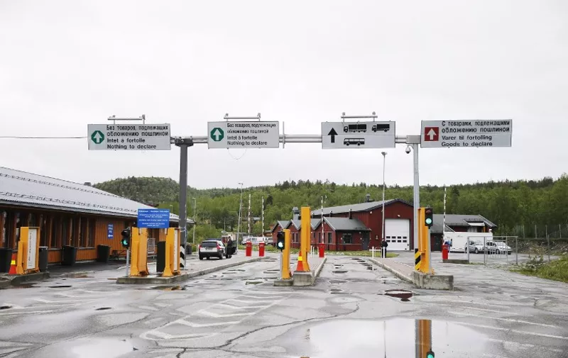 This June 6, 2013 picture show Storskog Boris Gleb border crossing between Norway and Russia near the Norwegian town of Kirkenes in the far north of the country. A group of intrepid Syrian migrants have found a new, albeit long, way into Europe --  through Russia and into Norway's Arctic, some of them cycling across the border. AFP PHOTO / Cornelius Poppe / NTB scanpix   --NORWAY OUT--