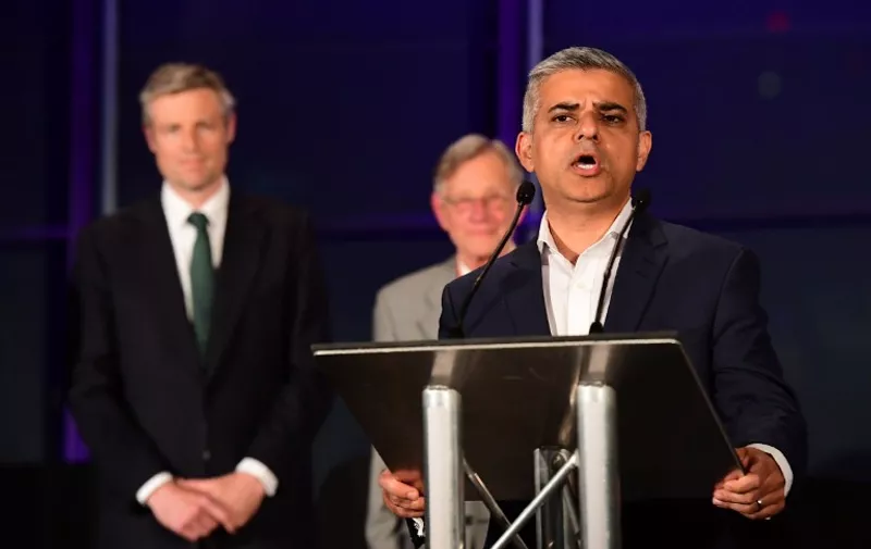 Newly elected London Mayor Sadiq Khan (Foreground) addresses the media following his election victory at City Hall in central London on May 7, 2016. 
London became the first EU capital with a Muslim mayor Friday as Sadiq Khan won the election that saw his opposition Labour party suffer nationwide setbacks. / AFP PHOTO / LEON NEAL