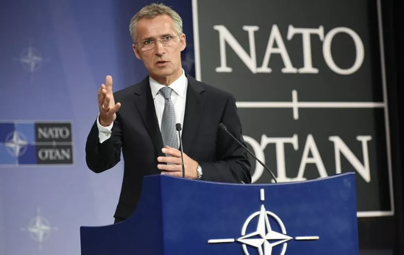 NATO Secretary-General Jens Stoltenberg gives a press conference following a Defence minister meeting at the NATO Headquarters in Brussels on October 8, 2015. AFP PHOTO/JOHN THYS