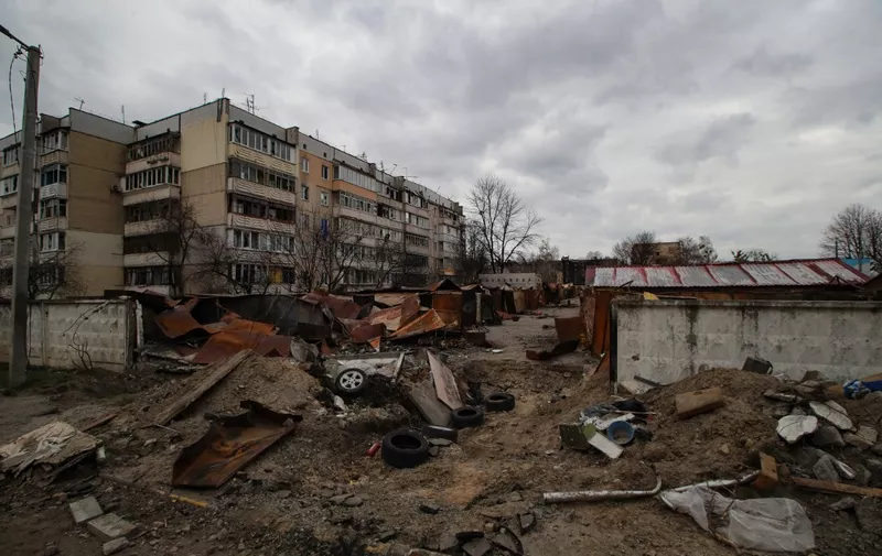 KYIV REGION, UKRAINE - APRIL 08, 2022 - Garages and a residential building damaged by the enemy shelling in the city liberated from the russian occupiers, Hostomel, Kyiv Region, north-central Ukraine (Photo by Pavlo Bahmut/Ukrinform/NurPhoto) (Photo by Pavlo Bahmut / NurPhoto / NurPhoto via AFP)