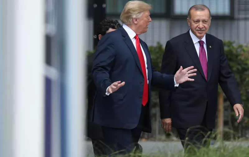 BRUSSELS, BELGIUM - JULY 11: U.S. President Donald Trump (L) and Turkish President Recep Tayyip Erdogan attend the opening ceremony at the 2018 NATO Summit at NATO headquarters on July 11, 2018 in Brussels, Belgium. Leaders from NATO member and partner states are meeting for a two-day summit, which is being overshadowed by strong demands by U.S. President Trump for most NATO member countries to spend more on defense.  (Photo by Sean Gallup/Getty Images)
