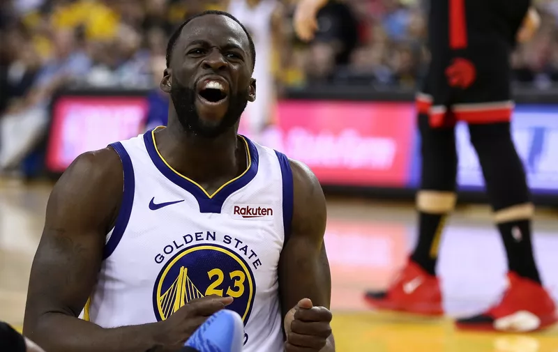 OAKLAND, CALIFORNIA - JUNE 05:  Draymond Green #23 of the Golden State Warriors reacts against the Toronto Raptors during Game Three of the 2019 NBA Finals at ORACLE Arena on June 05, 2019 in Oakland, California. NOTE TO USER: User expressly acknowledges and agrees that, by downloading and or using this photograph, User is consenting to the terms and conditions of the Getty Images License Agreement. (Photo by Ezra Shaw/Getty Images)