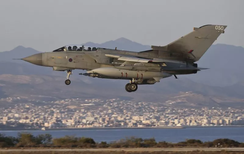 A handout picture retrieved from the British Ministry of Defence's Defence News Imagery website on December 1, 2015 shows a British Royal Air Force RAF Tornado GR4 pictured on return to RAF Akrotiri Cyprus after an armed reconnaissance mission in support of OP SHADER on September 30, 2014. Royal Air Force Tornado GR4 aircraft have been in action over Iraq as part of the international coalitions operations to support the democratic Iraqi Government in the fight against ISIL. Britain looks poised to join air strikes on Islamic State (IS) group targets in Syria this week after Prime Minister David Cameron announced November 30 that a vote would be held in parliament December 2, 2015.  RESTRICTED TO EDITORIAL USE - MANDATORY CREDIT  " AFP PHOTO / CROWN COPYRIGHT 2015 / CPL NEIL BRYDEN RAF "  -  NO MARKETING NO ADVERTISING CAMPAIGNS   -   DISTRIBUTED AS A SERVICE TO CLIENTS  -  NO ARCHIVE - TO BE USED WITHIN 2 DAYS FROM DEC 2, 2015 (48 HOURS), EXCEPT FOR MAGAZINES WHICH CAN PRINT THE PICTURE WHEN FIRST REPORTING ON THE EVENT / AFP / CROWN COPYRIGHT 2015 / CPL NEIL BRYDEN RAF