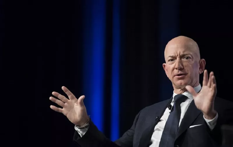 (FILES) In this file photo taken on September 19, 2018 Amazon and Blue Origin founder Jeff Bezos provides the keynote address at the Air Force Association's Annual Air, Space &amp; Cyber Conference in Oxen Hill, MD. - Amazon CEO Jeff Bezos on February 7, 2019 accused the publisher of the National Enquirer of "blackmail" after it threatened to publish intimate photographs sent by the billionaire to his mistress. (Photo by Jim WATSON / AFP)