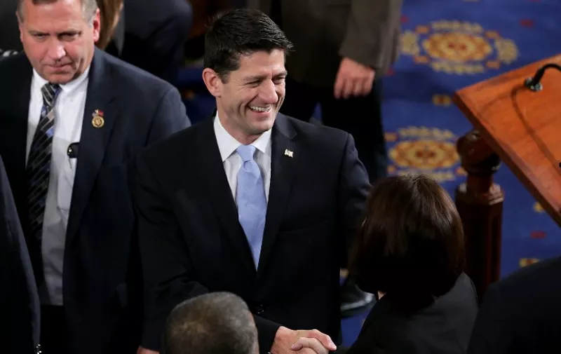 WASHINGTON, DC - OCTOBER 29: U.S. Rep. Paul Ryan (R-WI) greets fellow members of the U.S. House of Representatives on the floor of the House chamber October 29, 2015 in Washington, DC. The House is expected to elect Ryan (R-WI) as the 62nd Speaker of the House, replacing U.S. Rep. John Boehner (R-OH), later in the day.   Chip Somodevilla/Getty Images)   Chip Somodevilla/Getty Images/AFP