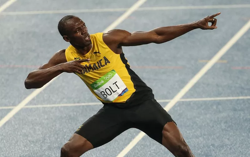 RIO DE JANEIRO, BRAZIL - (ARCHIVE): A file photo dated August 18, 2016 shows Usain Bolt of Jamaica celebrates winning the gold medal in the Men's 200m Final of the Rio 2016 Olympic Games at the Olympic Stadium in Rio de Janeiro, Brazil. Usain Bolt has tested positive for COVID-19. Salih Zeki Fazlioglu / Anadolu Agency (Photo by SALIH ZEKI FAZLIOGLU / ANADOLU AGENCY / Anadolu Agency via AFP)