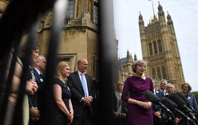 British Conservative party leadership candidate Theresa May speaks to members of the media at The St Stephen's entrance to the Palace of Westminster in London on July 7, 2016.
Conservative lawmakers in Britain Thursday selected interior minister Theresa May and junior energy minsiter Andrea Leadsom as the two candidates to be prime minister and the choice will now go to party members. May won 199 votes out of the party's 329 MPs, while Leadsom won 84 votes, a party official said, meaning third challenger Michael Gove -- Britain's justice minister -- has been rejected.
 / AFP PHOTO / Ben STANSALL