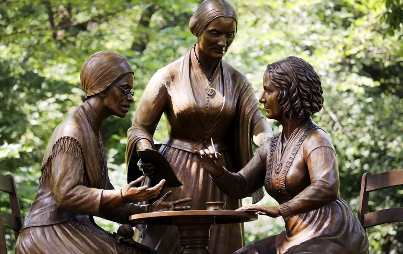 NEW YORK, NEW YORK - AUGUST 26: A new statue of women's rights pioneers Sojourner Truth, Susan B Anthony, and Elizabeth Cady Stanton is unveiled at Central Park on the 100th anniversary of the 19th amendment on August 26, 2020 in New York City. Artist Meredith Bergmann, a lifelong New Yorker, sculpted the statue of the three main figures in the women's rights movement. None of the woman lived long enough to see American women gain the right to vote.   Spencer Platt/Getty Images/AFP