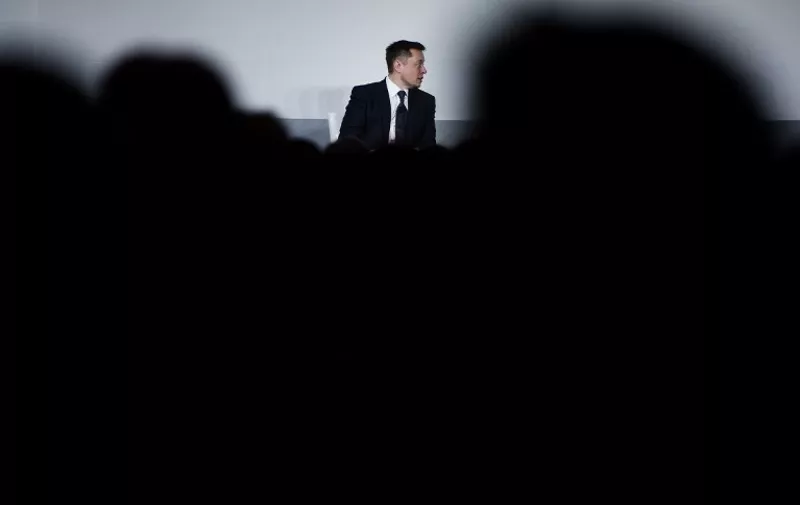 Elon Musk, CEO of SpaceX and Tesla, speaks during the International Space Station Research and Development Conference at the Omni Shoreham Hotel July 19, 2017 in Washington, DC. / AFP PHOTO / Brendan Smialowski