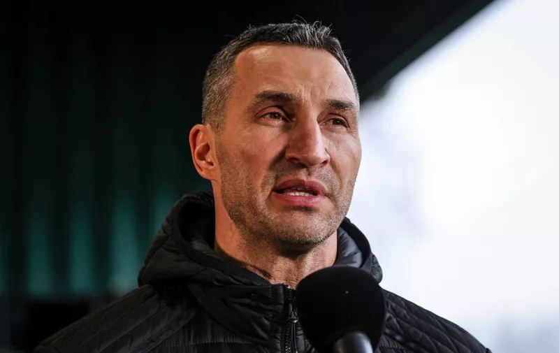 Ukrainian former boxer Wladimir Klitschko gives a media statement at the Armoured Corps Training Centre (Panzertruppenschule) in Munster, northern Germany, on February 20, 2023. Soldiers from Ukraine are currently being trained on the Leopard 2A6 tank and the Marder fighting vehicle in the tank troop training centre. (Photo by FOCKE STRANGMANN / AFP)