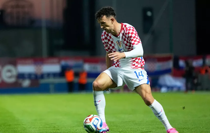 Croatia's Ivan Perisic is in action during the international friendly soccer match between Croatia and Slovenia in Varazdin, Croatia, Sunday, June 7, 2026, (AP Photo/Darko Bandic)