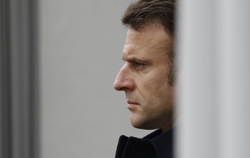 French President Emmanuel Macron attends a ceremony in tribute to French GIGN gendarme Marechal des Logis-Chef Arnaud Blanc, who was killed in an operation against illegal gold mining in French Guiana, at the French National Gendarmerie Intervention Group (GIGN) base of Versailles-Satory in Versailles, west of Paris, on March 31, 2023. The 35-year-old elite gendarmerie sub-officer was killed in the French overseas territory in South America on March 25, 2023, after being shot by an armed group during the operation. (Photo by Ludovic MARIN / POOL / AFP)