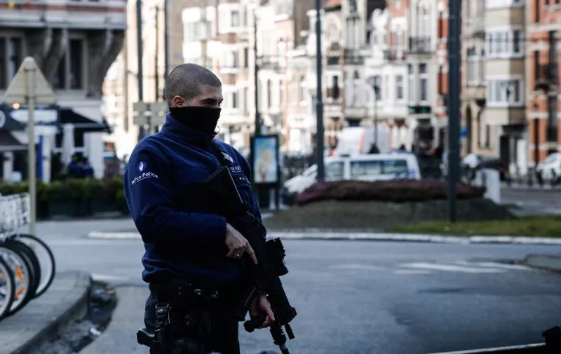 Police and bomb squad operation to neutralize Brussels attacks suspect on Schaerbeek, in Brussels, on March 25, 2016. Alexandros Michailidis / SOOC