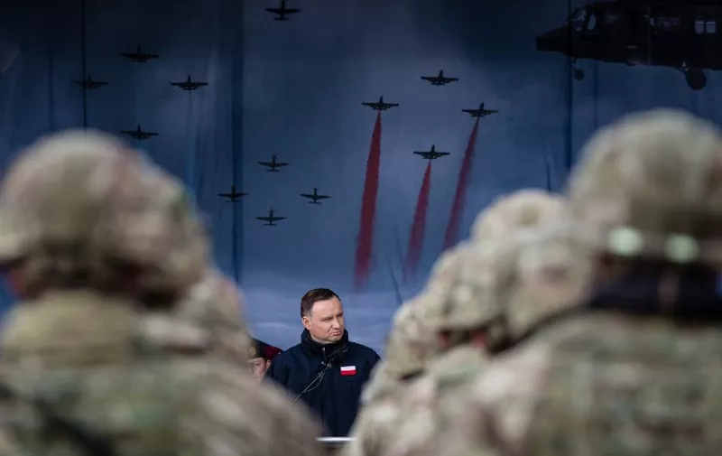 Polish President Andrzej Duda speaks during an official welcoming ceremony of NATO troops in Orzysz, Poland, on April 13, 2017.
The batallion is one of four NATO is deploying for the first time to Poland and the Baltic states as tripwires against Russian adventurism on its eastern flank, a region formerly under Moscow's control and spooked by its actions in Ukraine. / AFP PHOTO / Wojtek RADWANSKI / The erroneous mention[s] appearing in the metadata of this photo by Wojtek RADWANSKI has been modified in AFP systems in the following manner: [Orzysz] instead of [Warsaw]. Please immediately remove the erroneous mention[s] from all your online services and delete it (them) from your servers. If you have been authorized by AFP to distribute it (them) to third parties, please ensure that the same actions are carried out by them. Failure to promptly comply with these instructions will entail liability on your part for any continued or post notification usage. Therefore we thank you very much for all your attention and prompt action. We are sorry for the inconvenience this notification may cause and remain at your disposal for any further information you may require.